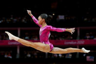 <b>Gabrielle Douglas - 16</b><br>Gabrielle Douglas of the United States competes on the balance beam in the Artistic Gymnastics Women's Individual All-Around final on Day 6 of the London 2012 Olympic Games at North Greenwich Arena on August 2, 2012 in London, England. (Photo by Streeter Lecka/Getty Images)