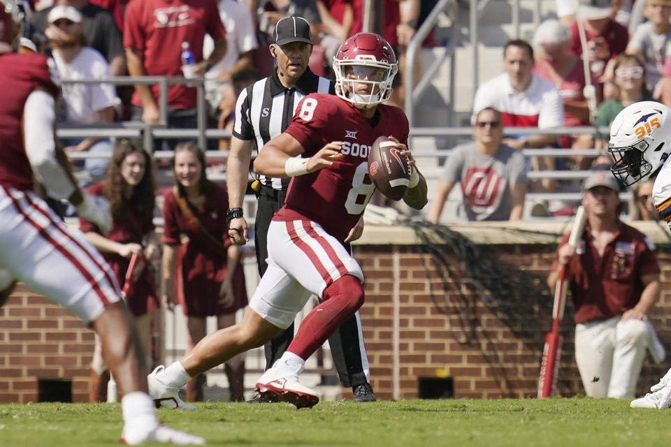 Oklahoma quarterback Dillon Gabriel (8) scrambles in the first half of an NCAA college football game against UTEP, Saturday, Sept. 3, 2022, in Norman, Okla. (AP Photo/Sue Ogrocki)