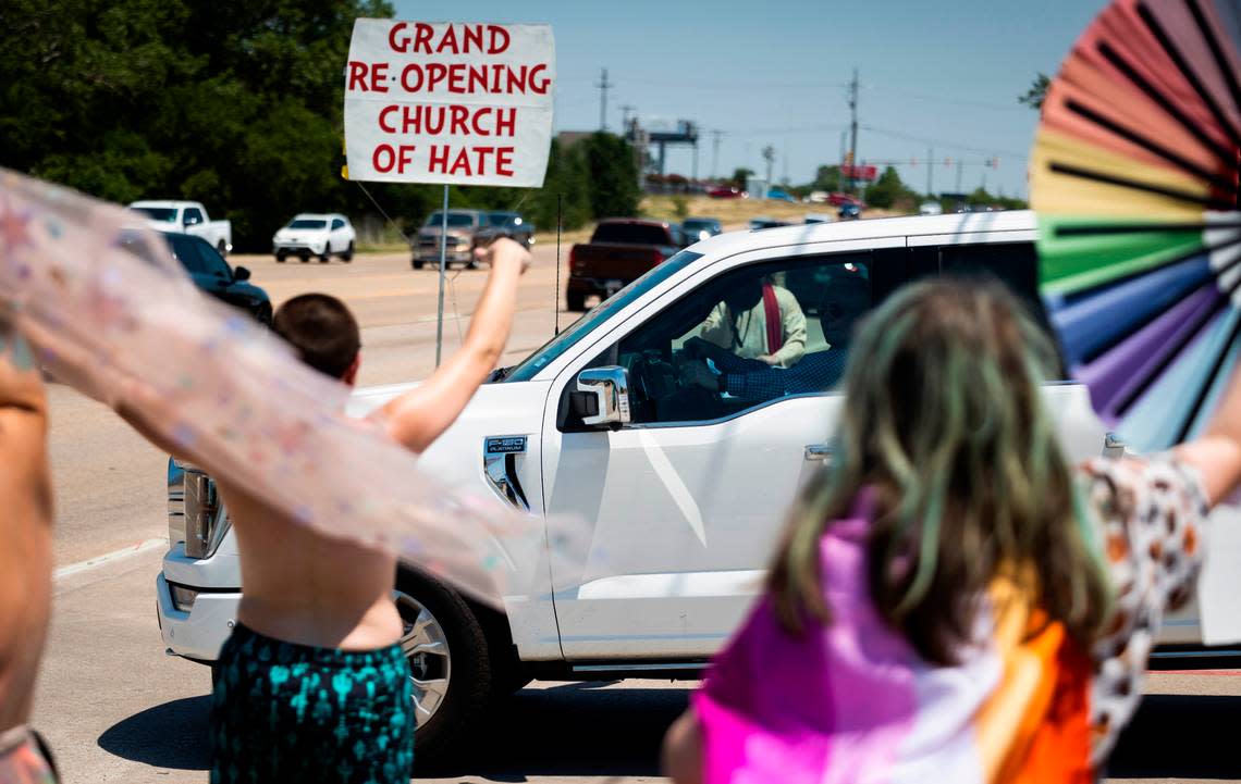 No Hate in Texas protesters shout as churchgoers leave after service at Stedfast Baptist Church on June 26, in Watauga. 