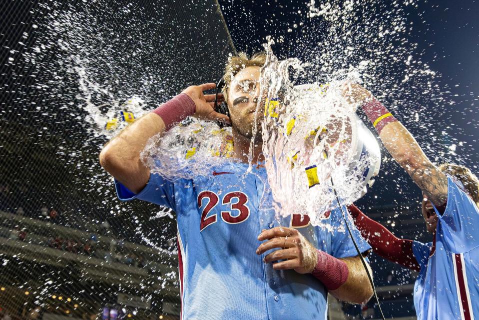 Phillies first baseman Kody Clemens is doused by water after hitting a walk-off single during the ninth inning of the Tigers' 3-2 loss on Thursday, June 8, 2023, in Philadelphia.