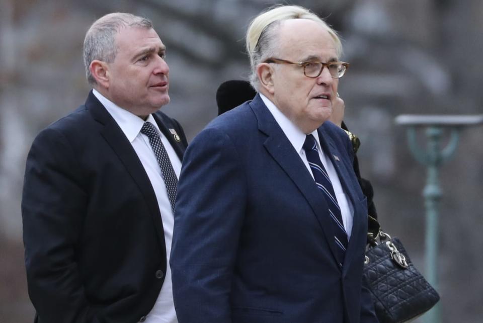 <div class="inline-image__caption"><p>Rudy Giuliani and Lev Parnas, left, arrive for the funeral of late U.S. President George H.W. Bush at the National Cathedral in Washington</p></div> <div class="inline-image__credit">Alex Edelman/Getty</div>