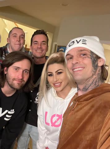 <p>Aaron Carter</p> Morgan Matthews (left) with Aaron Carter (right) and others.