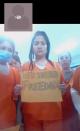 Migrants detained in an ICE detention facility in rural Louisiana display signs related to coronavirus disease