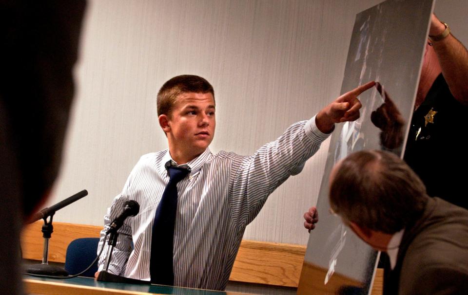 While being questioned in a civil trial June 6, 2005, Stephen Bromstrup points to where his car was parked on a blown up aerial photograph of the John and Barbara O'Brien's Stuart residence the night of his June 18, 2002, car crash that killed Sarah Stone and Alexandra Quaroni.  John and Barbara O'Brien were being sued by  Tim and Beth Stone, charging the couple knowingly had alcohol at their daughter's 2002 cookout . The Stones sued the O'Briens under the state's Open House Party Law, claiming the couple failed to take reasonable steps to prevent minors from drinking the day of the crash. The O'Briens testified they did find teens drinking during the cookout and confiscated the alcohol. Jurors did not hold them responsible for the crash.