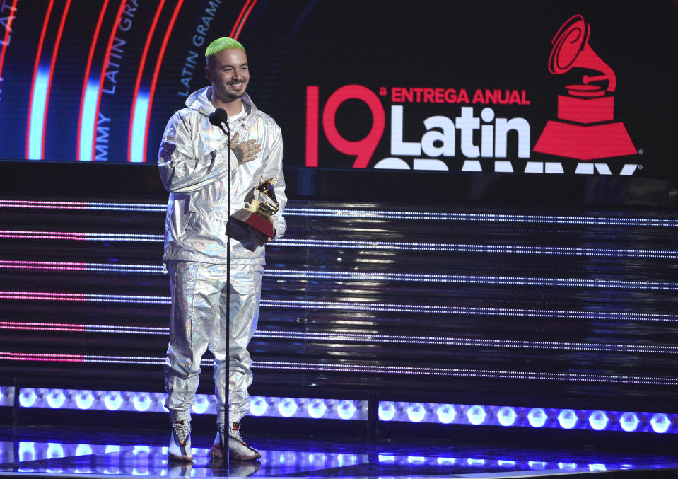 J Balvin accepts the award for best urban music album for "Vibras" at the Latin Grammy Awards on Thursday, Nov. 15, 2018, at the MGM Grand Garden Arena in Las Vegas. (Photo by Chris Pizzello/Invision/AP)