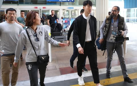 Heung-Min Son arrives at Dubai airport for the Asia Cup - Credit: afp