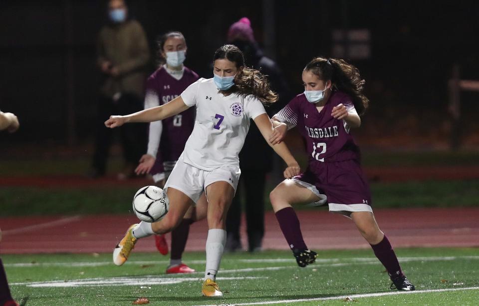 New Rochelle's Amalia Cardo (7, left) is one of the candidates for Journal News/lohud Girls Soccer Player of the Week.