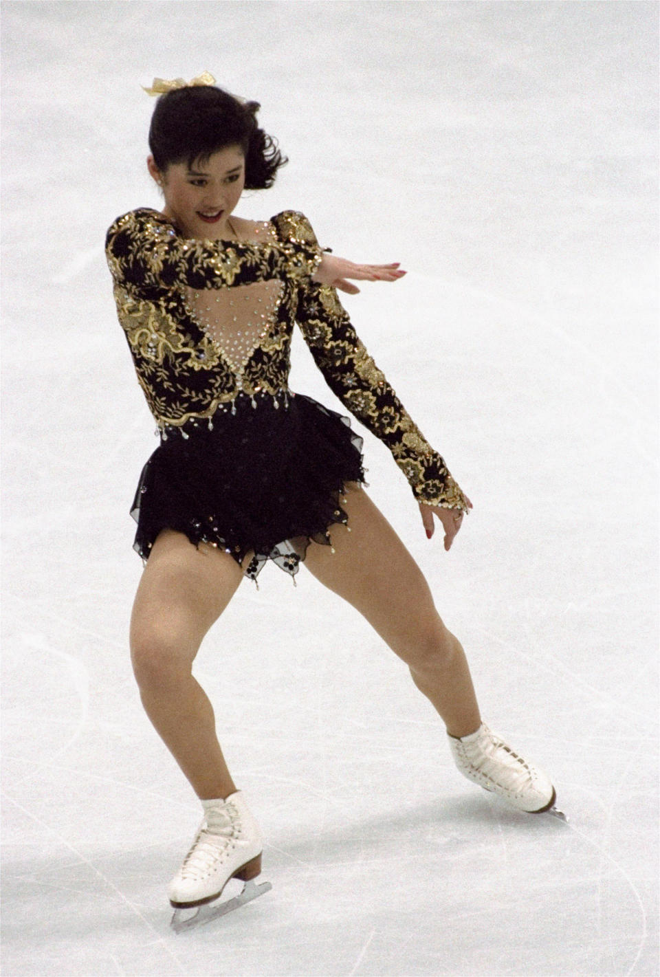 FILE - Kristi Yamaguchi of the U.S. skates in the free skating portion of the women's figure skating competition at the XVI Winter Olympic Games in Albertville, France on Friday, Feb. 21, 1992. The Fremont, Calif., woman won the women's gold medal. (AP Photo/Lionel Cironneau, File)