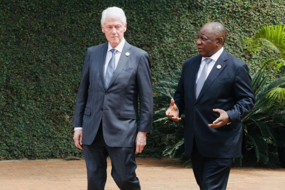 Former U.S. President Bill Clinton and South African President Cyril Ramaphosa attend a ceremony commemorating the 30th anniversary of the genocide in Kigali, Rwanda.<span class="copyright">Cyrile Ndegeya—Getty Images</span>