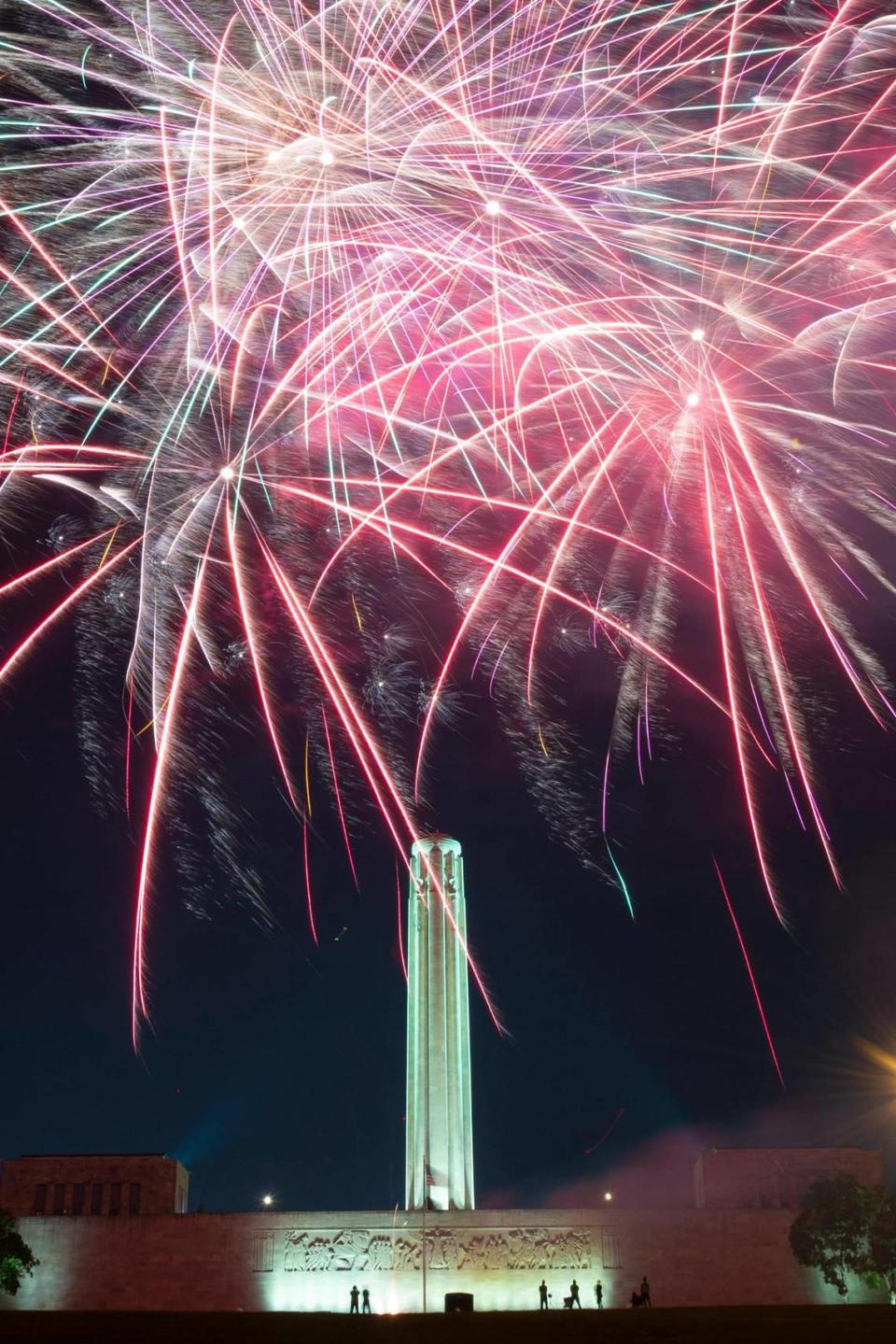 Fireworks light the sky over Liberty Memorial Saturday night during the Stars and Strips Picnic Independence Day celebration at the National WWI Museum and Memorial.