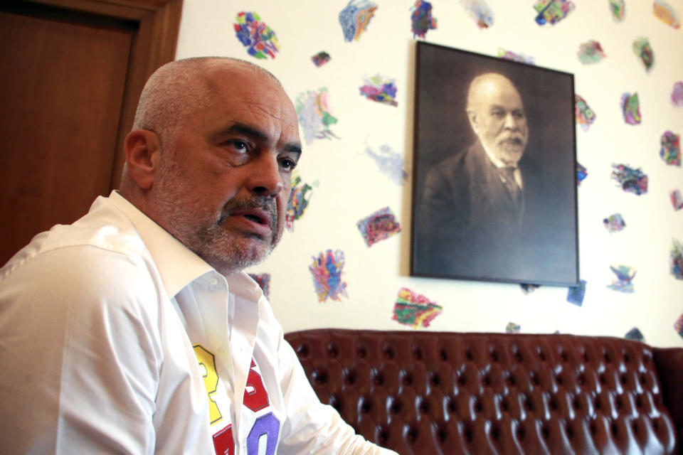 Albanian prime minister Edi Rama speaks during an interview to the Associated Press in Tirana, Friday, June 21, 2019. Rama says the opposition's main goal is to disrupt the country's efforts to launch full membership negotiations with the European Union. (AP Photo/Hektor Pustina)