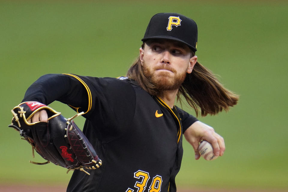 Pittsburgh Pirates starting pitcher Dillon Peters delivers during the first inning of a baseball game against the Cincinnati Reds in Pittsburgh, Tuesday, Sept. 14, 2021. (AP Photo/Gene J. Puskar)