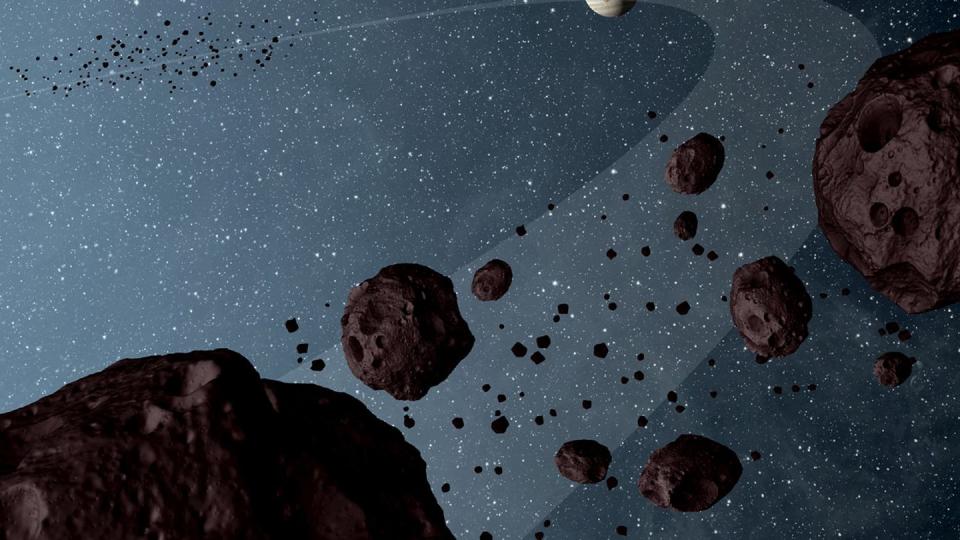 Eine NASA-Illustration zeigt die sogenannten «Trojan asteroids», die auf der Umlaufbahn des Jupiters in derselben Richtung kreisen. Foto: NASA/JPL-Caltech