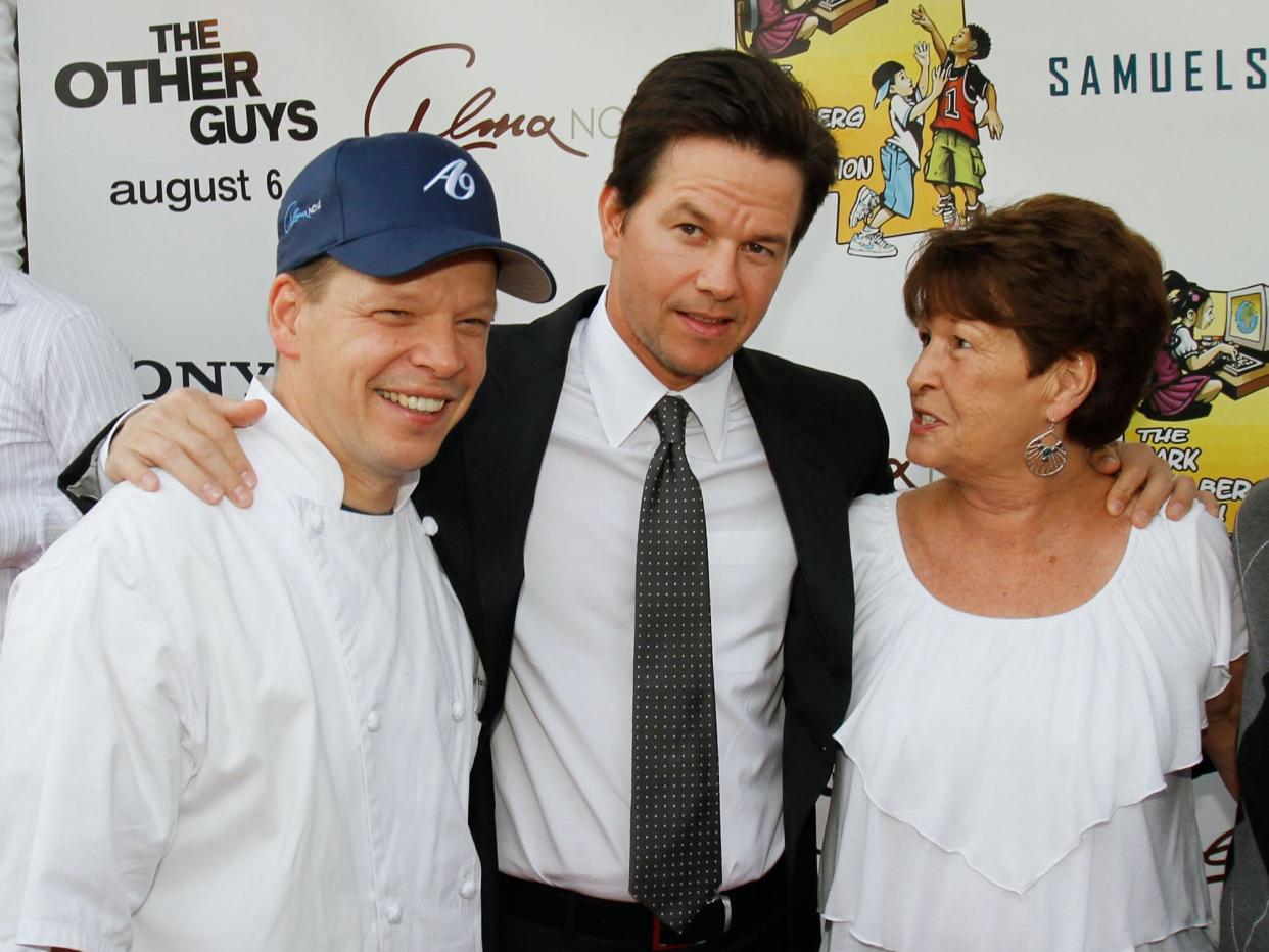 Brothers Paul and Mark Wahlberg with their mother Alma, at the premiere of Mark Wahlberg’s film The Other Guys (Getty Images)