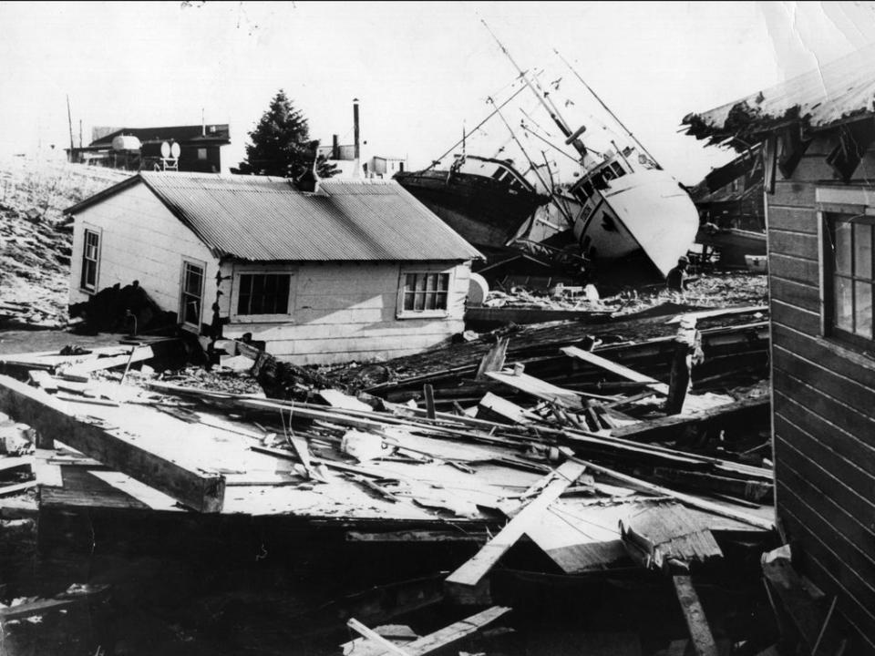 A small fishing village on Kodiak Island in Alaska littered with debris from houses and boats after an earthquake and tidal wave struck it on 4 April 1964 (Central Press/Getty)