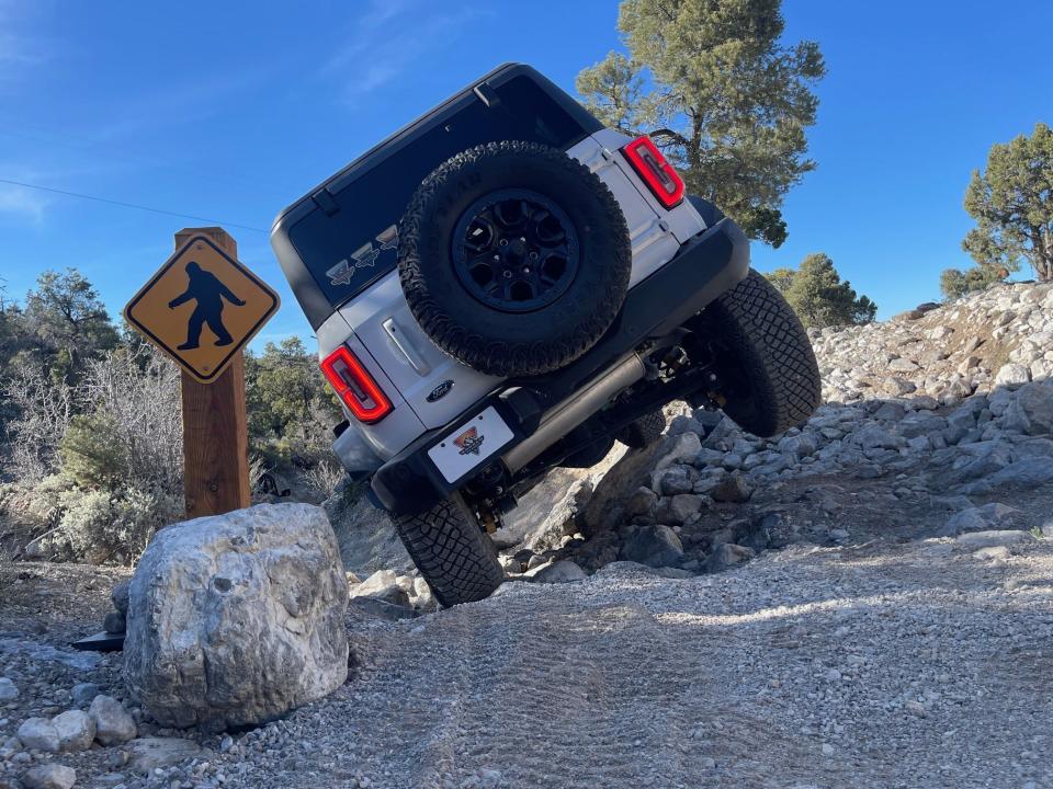 A guide at the Ford Bronco Off-Roadeo in Nevada on April 15, 2024 drives ahead of Detroit Free Press reporter Phoebe Wall Howard to show her how precision driving over rocks protects the vehicle and provides maximum control for off-roading.