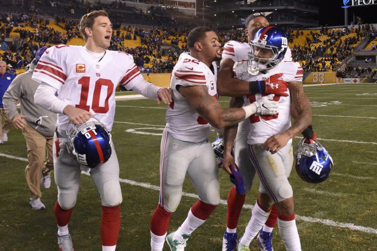 Odell Beckham had to be restrained by teammates from going after an official after last Sunday's game. (AP)