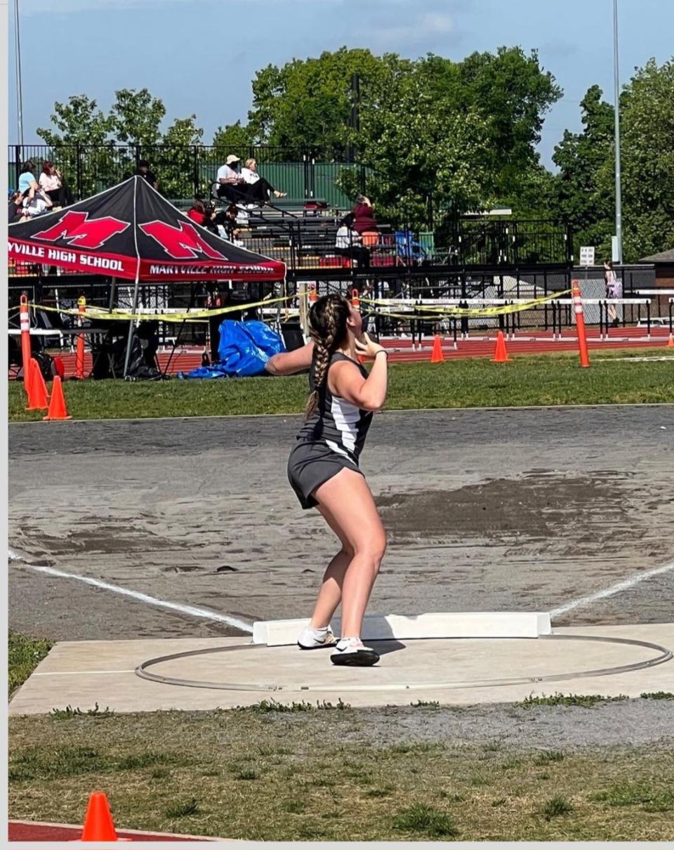 Zoe Addison Smith, Gibbs Middle School eighth grader, competes in the shotput event on April 30, 2023.
