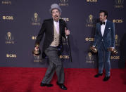 Brendan Hunt, left, and Jason Sudeikis pose with their awards for outstanding comedy series and outstanding lead actor in a comedy series for "Ted Lasso" at the 73rd Primetime Emmy Awards on Sunday, Sept. 19, 2021, at L.A. Live in Los Angeles. (AP Photo/Chris Pizzello)