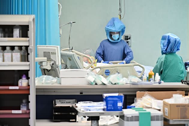 Medical staff members take care of a patient at the Covid-19 Intensive Care Unit (ICU) at the Policlinico Tor Vergata Hospital, in Rome, on January 5, 2021. (Photo by Andreas SOLARO / AFP) (Photo by ANDREAS SOLARO/AFP via Getty Images) (Photo: ANDREAS SOLARO via Getty Images)