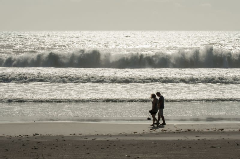 A couple walks along the beach in Delray Beach, Fla., on September 11, 2017. On March 3, 1845, Florida was admitted to the United States as the 27th state. File Photo by Ken Cedeno/UPI