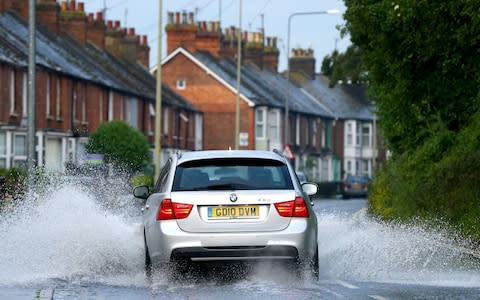 A flooded road in Rye, East Sussex - Credit: Gareth Fuller/PA Wire