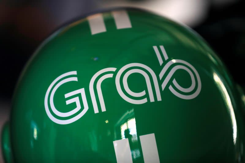 FILE PHOTO: A Grab motorbike helmet is displayed during a news conference in Singapore