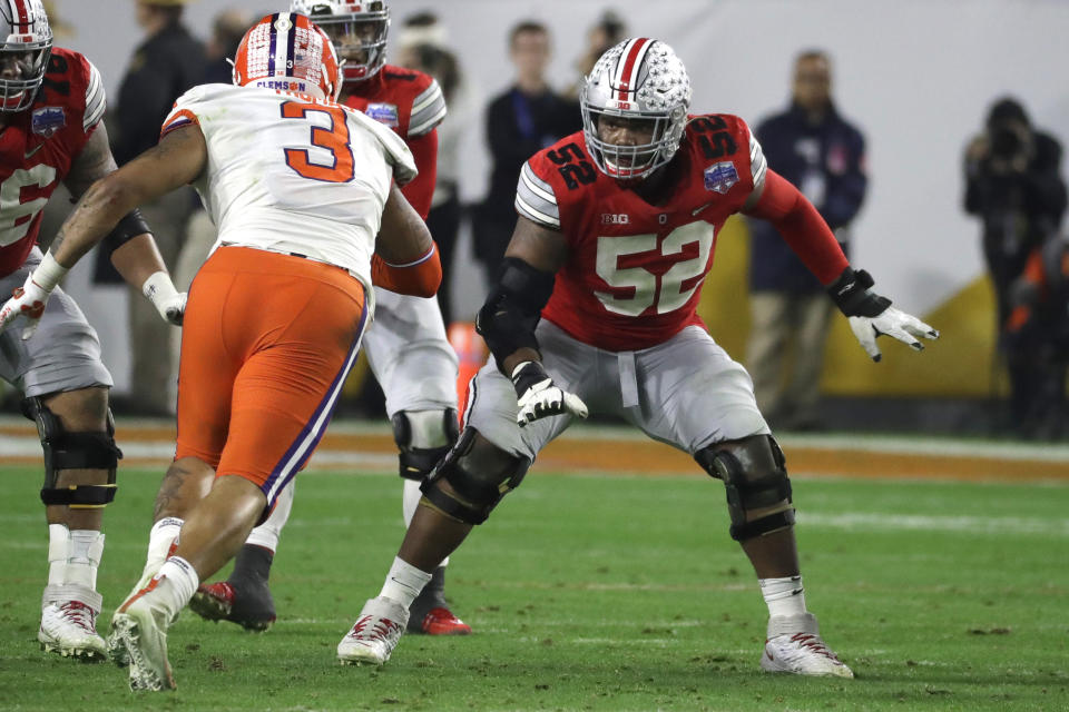 Ohio State offensive lineman Wyatt Davis (52) during the first half of the Fiesta Bowl NCAA college football game against Clemson, Saturday, Dec. 28, 2019, in Glendale, Ariz. (AP Photo/Rick Scuteri).