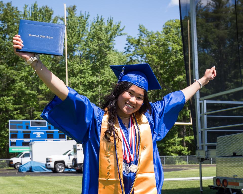 Kennebunk High School graduate Samantha McGrath celebrates after receiving her diploma during commencement on Sunday, June 5, 2022 in Kennebunk.