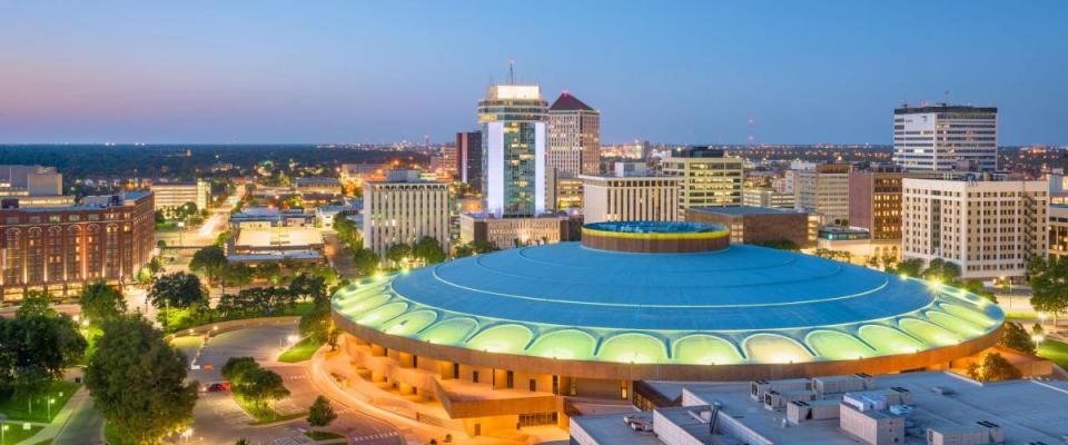 Wichita, Kansas, USA downtown skyline at dusk.