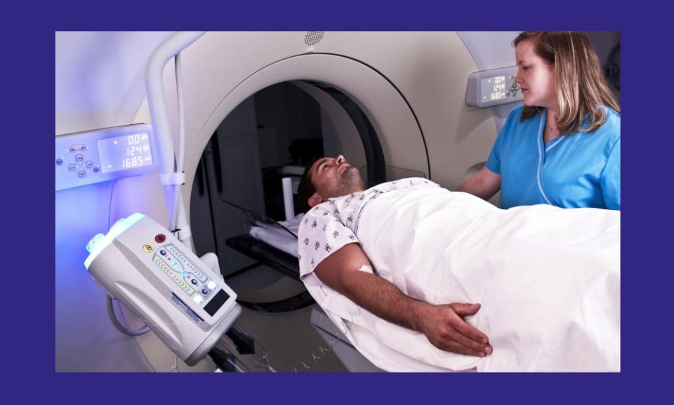 A patient entering a CT scan.