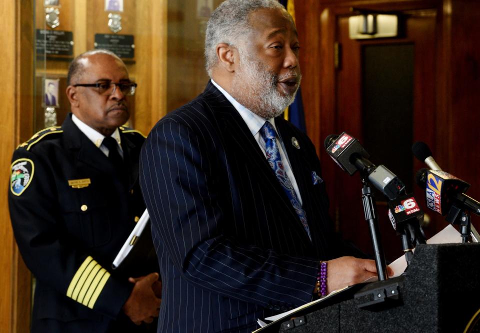 Shreveport Police Chief Wayne Smith listens to Caddo Parish District Attorney James Stewart during the press conference Wednesday, February 7, 2024 at the Shreveport Police Station.