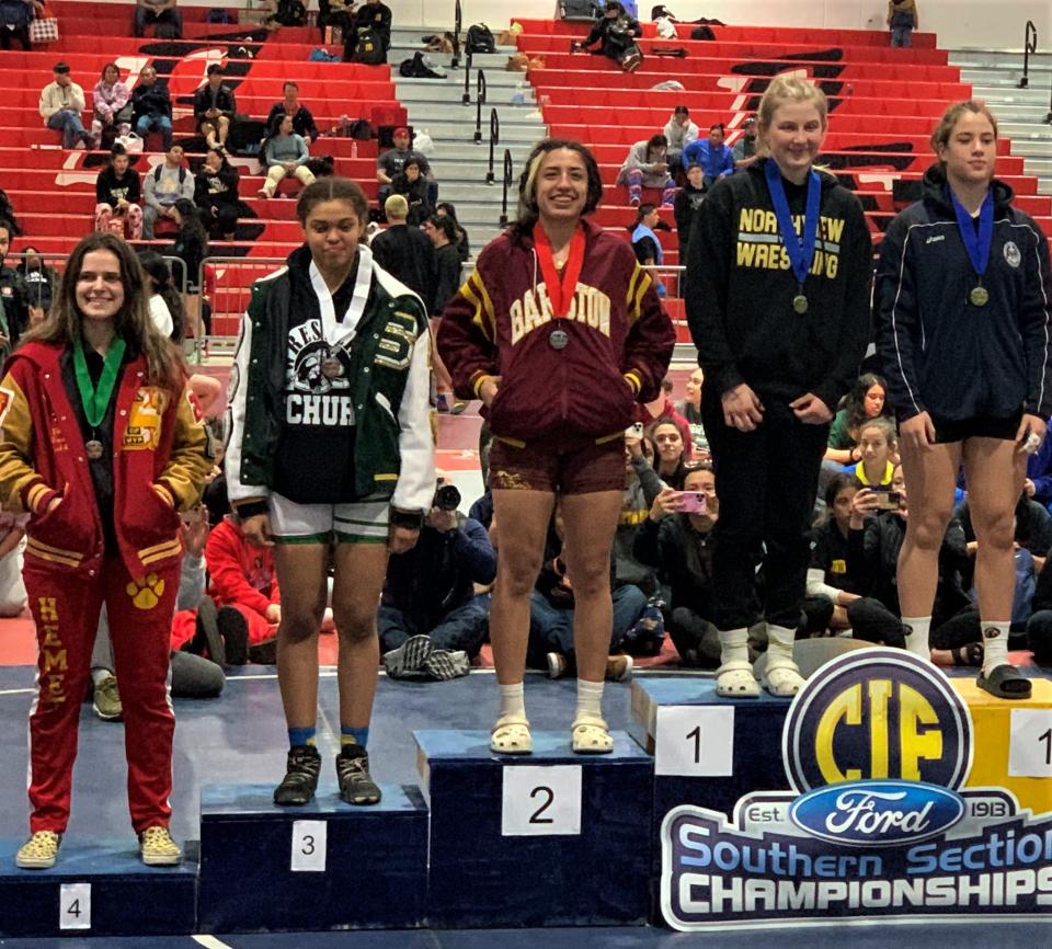 Barstow’s Mariah Rodriguez (center) after her second-place finish last season.
