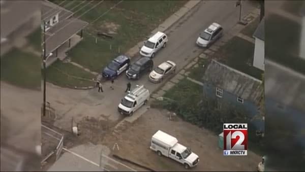 News footage of cars on the street