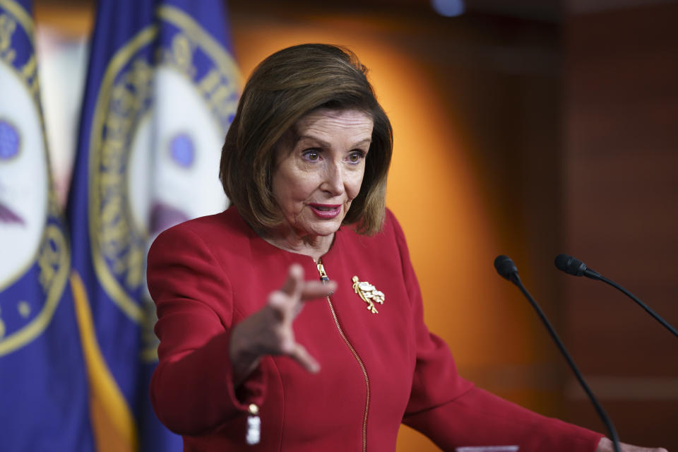 FILE - In this Sept. 8, 2021, file photo speaker of the House Nancy Pelosi, D-Calif., meets with reporters to discuss President Joe Biden's domestic agenda including passing a bipartisan infrastructure bill and pushing through a Democrats-only expansion of the social safety net, the at the Capitol in Washington. (AP Photo/J. Scott Applewhite, File)