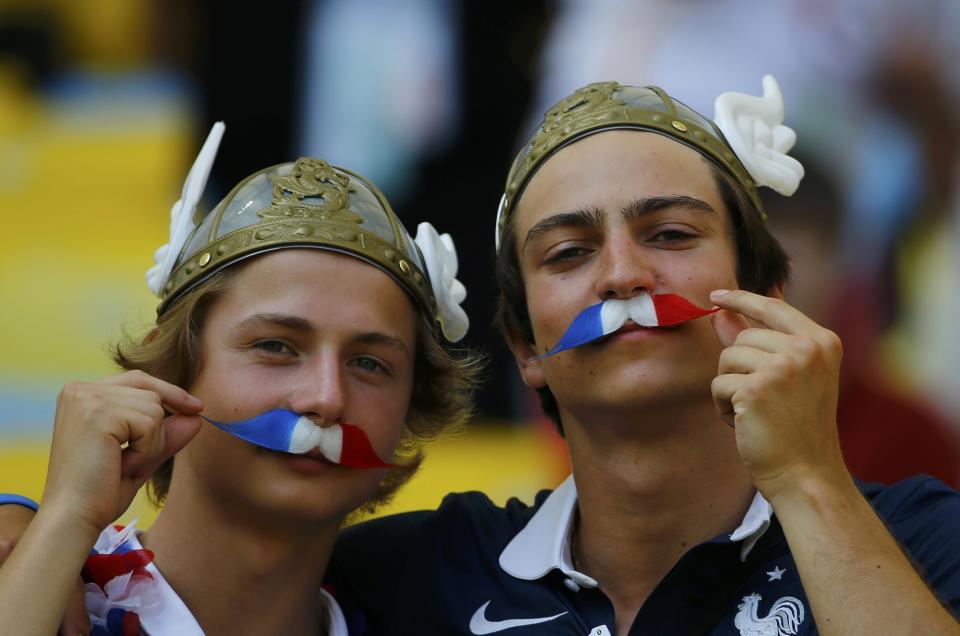 French fans wait for the start of the 2014 World Cup quarter-finals between Germany and France at the Maracana stadium in Rio de Janeiro July 4, 2014. REUTERS/Pilar Olivares