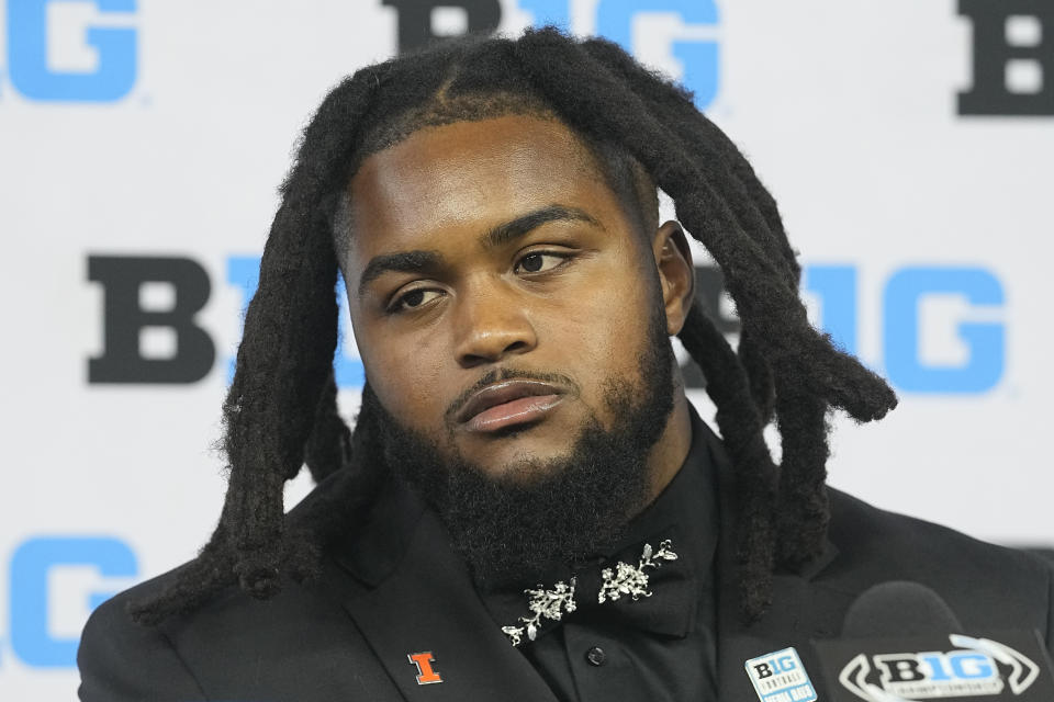 FILE - Illinois defensive lineman Jer'Zhan Newton listens during an NCAA college football news conference at the Big Ten Conference media days at Lucas Oil Stadium, Wednesday, July 26, 2023, in Indianapolis. Newton has been selected to The Associated Press midseason All-America team, Wednesday, Oct. 18, 2023.(AP Photo/Darron Cummings, File)