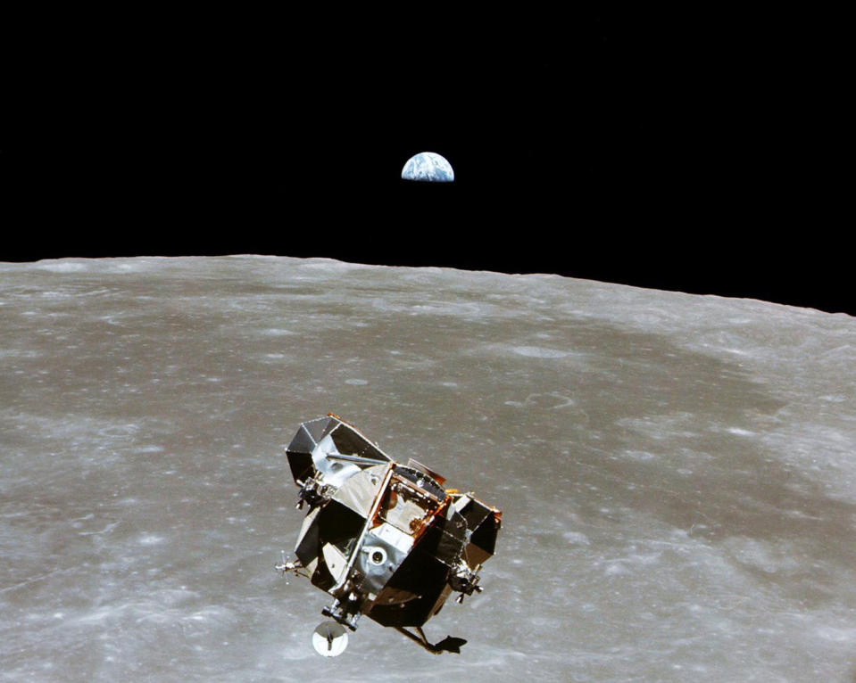 The Apollo 11 Lunar Module ascent stage, with astronauts Neil A. Armstrong and Edwin E. Aldrin Jr. aboard, is photographed from the Command and Service Modules in lunar orbit in this July, 1969 file handout photo.