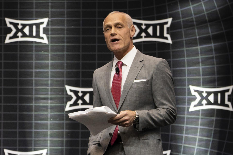 FILE - Big 12 Commissioner Brett Yormark speaks at the opening of the NCAA college football Big 12 media days in Arlington, Texas, Wednesday, July 12, 2023. Texas coach Steve Sarkisian was asked Monday, Aug. 28, at his weekly news conference about Yormark's recent comment telling Texas Tech coach Joey McGuire that his team “better take care of business” when the Red Raiders play Texas the day after Thanksgiving. (Sara Diggins/Austin American-Statesman via AP, File)