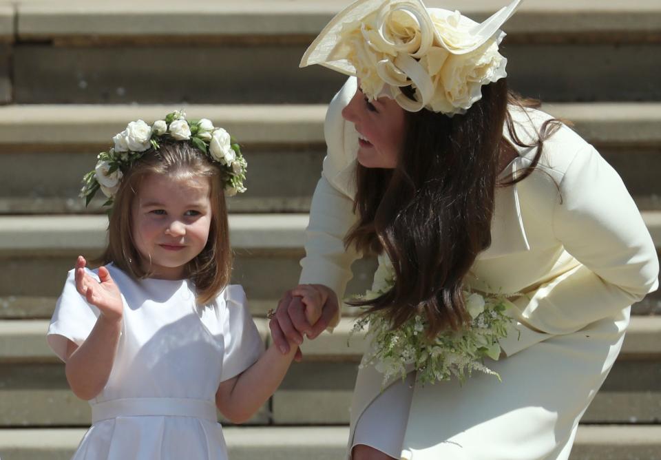 Princess Charlotte and Kate Middleton attend the wedding ceremony of Prince Harry and Meghan Markle at St George's Chapel, Windsor Castle, in Windsor, on May 19, 2018.