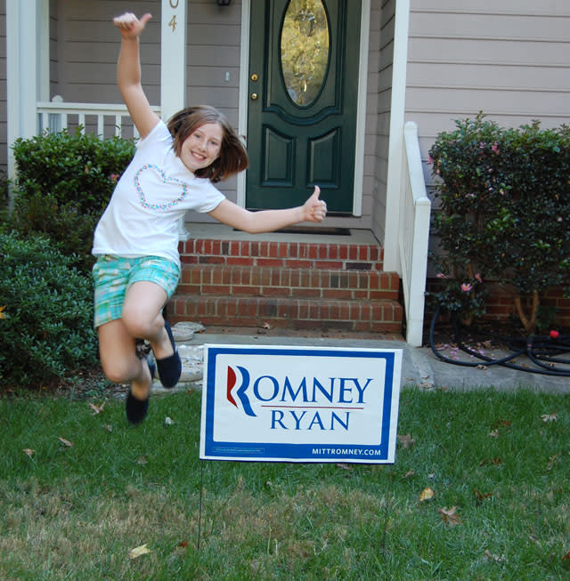 Jessica Turner of Raleigh, N.C., poses with the Romney sign outside her home. (Jim Turner)