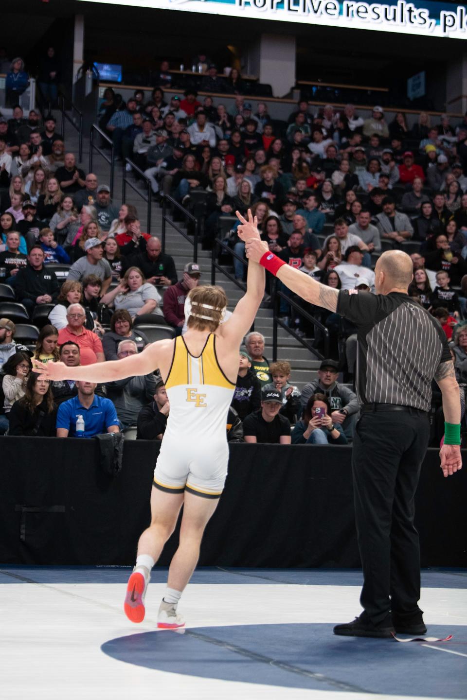 Pueblo East's Weston Dalton has his hand raised as the winner of the 150-pound championship match of the Class 4A state wrestling tournament at Ball Arena on Saturday.