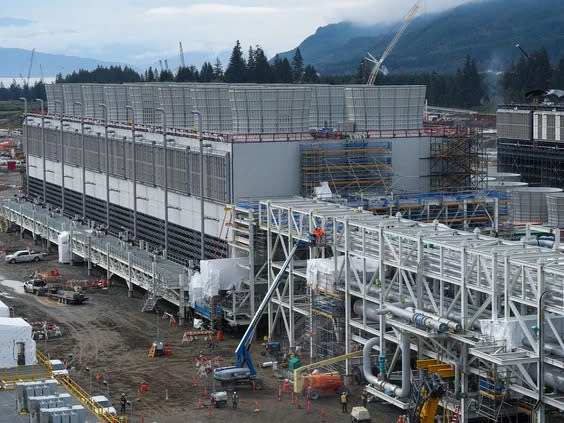 Cooling towers used to dissipate heat generated when natural gas is converted into liquefied natural gas are seen under construction at the LNG Canada export terminal in Kitimat, B.C. on Wednesday, September 28, 2022. Darryl Dyck/The Canadian Press