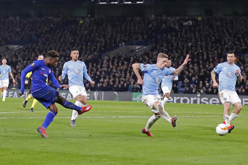 Chelsea's Callum Hudson-Odoi, left scores his side's third goal during the round of 32, second leg, Europa League soccer match between Chelsea and Malmo FF at Stamford Bridge stadium in London, Thursday Feb. 21, 2019. (AP Photo/Frank Augstein)