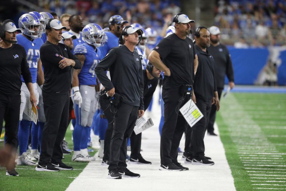 Lions offensive coordinator Ben Johnson, left, and head coach Dan Campbell on the sidelines during the second half of the Lions' 27-23 preseason loss to the Falcons on Friday, Aug. 12, 2022 at Ford Field.
