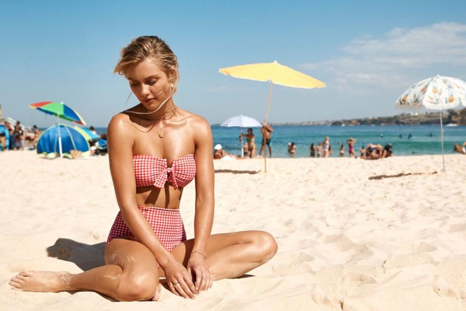 <p>The 2017 Block winner shows off her incredible figure while sporting red and white gingham bikini. Source: Seafolly </p>