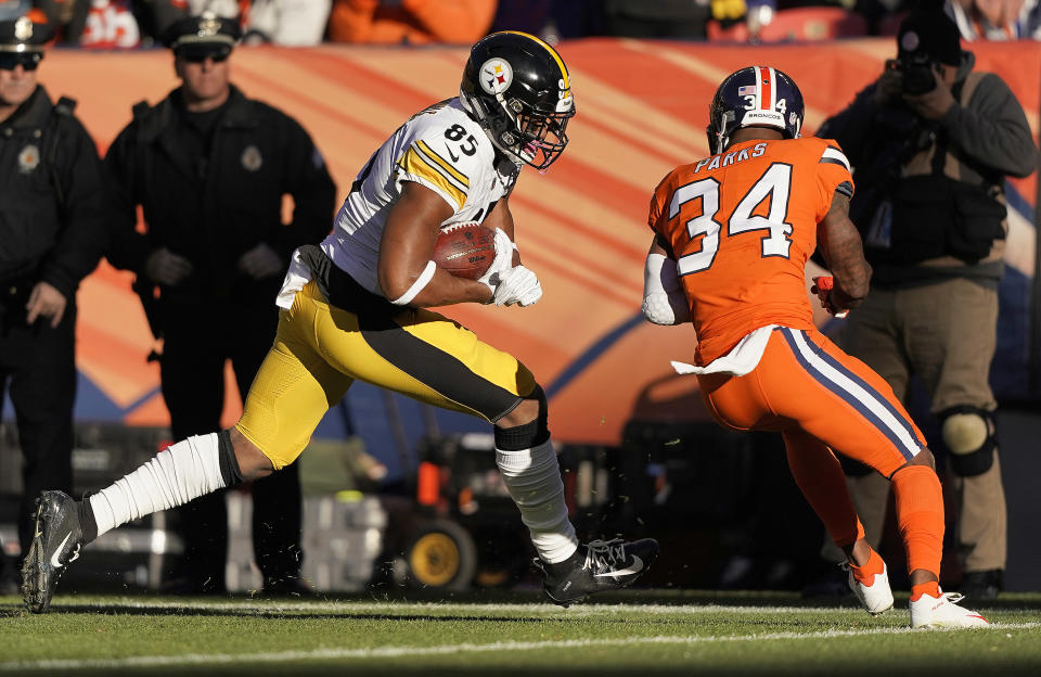 Xavier Grimble had a rough collision against Denver’s Will Parks. (AP)