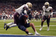 Texas State cornerback Kaleb Ford-Dement, left, breaks up a pass intended for UTSA wide receiver Tykee Ogle-Kellogg, center, during the second half of an NCAA college football game, Saturday, Sept. 9, 2023, in San Antonio. (AP Photo/Eric Gay)
