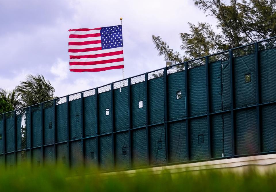 A nonstandard-sized U.S. flag flies at President Donald Trump's Mar-a-Lago resort in Florida on March 8 during his most recent visit there. Under an executive order signed by President Dwight Eisenhower in 1959, the official flag has a ratio of 1.9 to 1, length to height. This one doesn't meet those specifications. (Photo: Maria Alejandra Cardona for HuffPost)