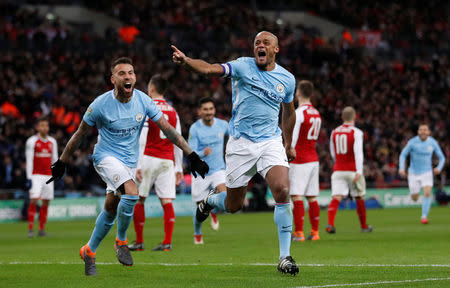 Soccer Football - Carabao Cup Final - Arsenal vs Manchester City - Wembley Stadium, London, Britain - February 25, 2018 Manchester City's Vincent Kompany celebrates scoring their second goal with Nicolas Otamendi Action Images via Reuters/Carl Recine